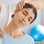 ACG-Licensed Chiropractor Doing Neck Adjustment to Female Patient in Modern Medical Office